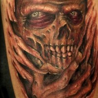 Tatuaggio colorato sul braccio iol demone