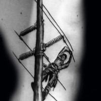 Detailed black ink arm tattoo of lineman worker