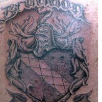 Detailed braddon family crest with motto tattoo on back