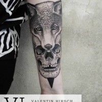 Detailed human skull with fox head arm tattoo by Valentin Hirsch
