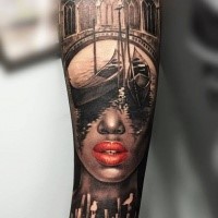 Detailed interesting looking arm tattoo of medieval city bridge with woman face
