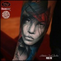Detailed looking colored arm tattoo of cute woman