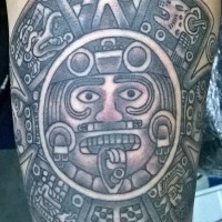 Detailed stone sun god aztec tattoo