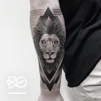 Dot style black ink arm tattoo of lion head with geometrical figures