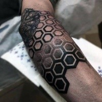 Dot style black ink arm tattoo of geometrical figures combined with flower