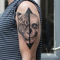 Dot style black ink shoulder tattoo by Valentin Hirsch