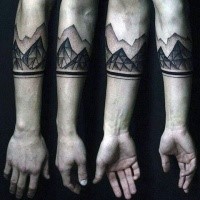 Dotwork style big forearm tattoo of geometrical mountains