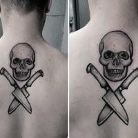 Dotwork style black ink upper back tattoo of human skull with crossed knifes