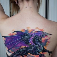 Dragon with purple wings tattoo on back