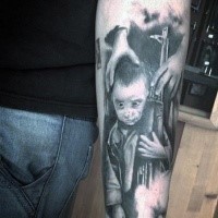 Dramatic black ink forearm tattoo of little boy with rifle