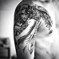 Dramatic designed detailed sad angel tattoo on shoulder