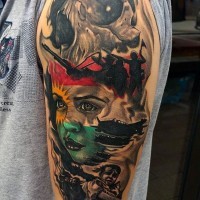 Dramatic multicolored war themed military tattoo on arm
