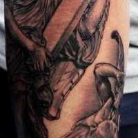 Dramatic religious themed black ink forearm tattoo on angels with cross