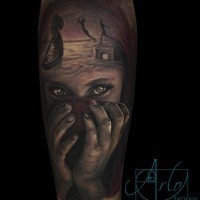 Dramatic style painted black ink sad girl portrait tattoo on forearm stylized with mystical people
