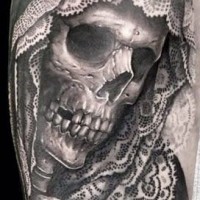 Dramatic style painted detailed skull in hood half sleeve tattoo