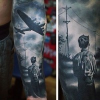 Dramatic WW2 dedicated black and white boy with military plane tattoo on sleeve