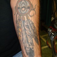 Dreamcatcher with feathers forearm tattoo