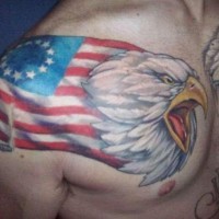 Eagle with usa flag tattoo on shoulder