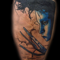 Edward Scissorhands and tree colored designed tattoo
