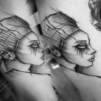Egypt themed painted by Inez Janiak biceps tattoo of woman portrait