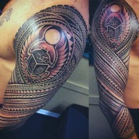 Egyptian scarab sleeve tattoo in tribal style