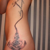 Elegant anchor tattoo on ribs for girls