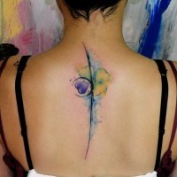 Elegant flower tattoo on upper back