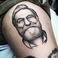Engraving style beautiful looking thigh tattoo of smiling old man face