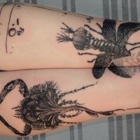 Engraving style black and white forearm tattoo of alien like insects and lettering