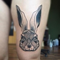 Engraving style black and white thigh tattoo of funny bunny