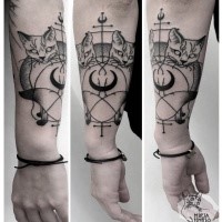 Engraving style black ink arm tattoo of creepy cats and symbols