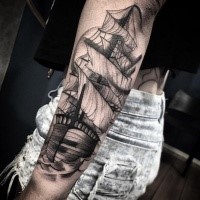 Engraving style black ink arm tattoo of large sailing ship