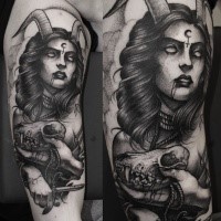 Engraving style black ink arm tattoo of mystical devil woman with skull and knife