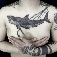 Engraving style black ink chest tattoo of shark with harpoons