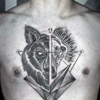 Engraving style black ink chest tattoo of terrifying wolf head with geometrical figures