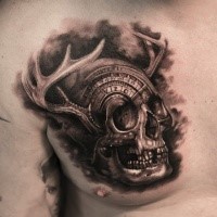 Engraving style black ink chest tattoo of fantasy skull with horns