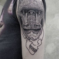 Engraving style black ink creepy monkey tattoo on shoulder with skull