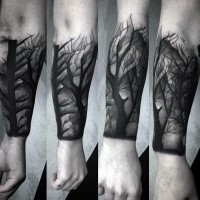 Engraving style black ink forearm tattoo of dark forest