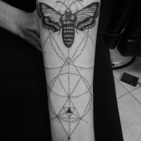 Engraving style black ink forearm tattoo of butterfly with ornaments