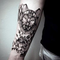 Engraving style black ink forearm tattoo of wolf head with stone human heart