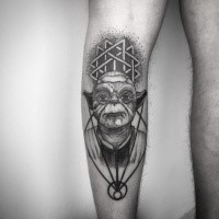 Engraving style black ink leg tattoo of Yoda with ornament