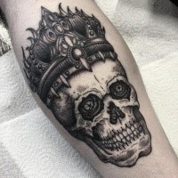 Engraving style black ink leg tattoo of creepy skull with crown