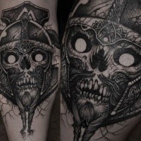 Engraving style black ink leg tattoo of demonic skull with helmet