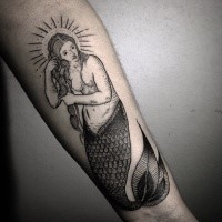Engraving style black ink mermaid tattoo with sun