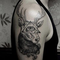 Engraving style black ink shoulder tattoo of deer with human eye and triangle