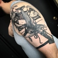 Engraving style black ink shoulder tattoo of big whale with squid