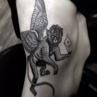 Engraving style black ink side tattoo of monkey angel