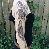 Engraving style black ink sleeve tattoo of whale with mushrooms