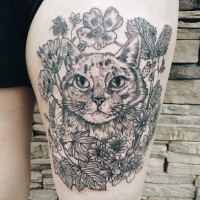 Engraving style black ink thigh tattoo of cat with plants and flowers
