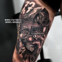 Engraving style colored biceps tattoo of old man with glasses and clock